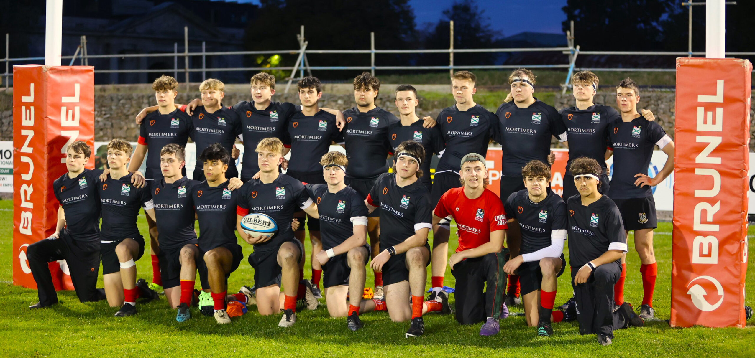 Plymouth College student rugby team on the field