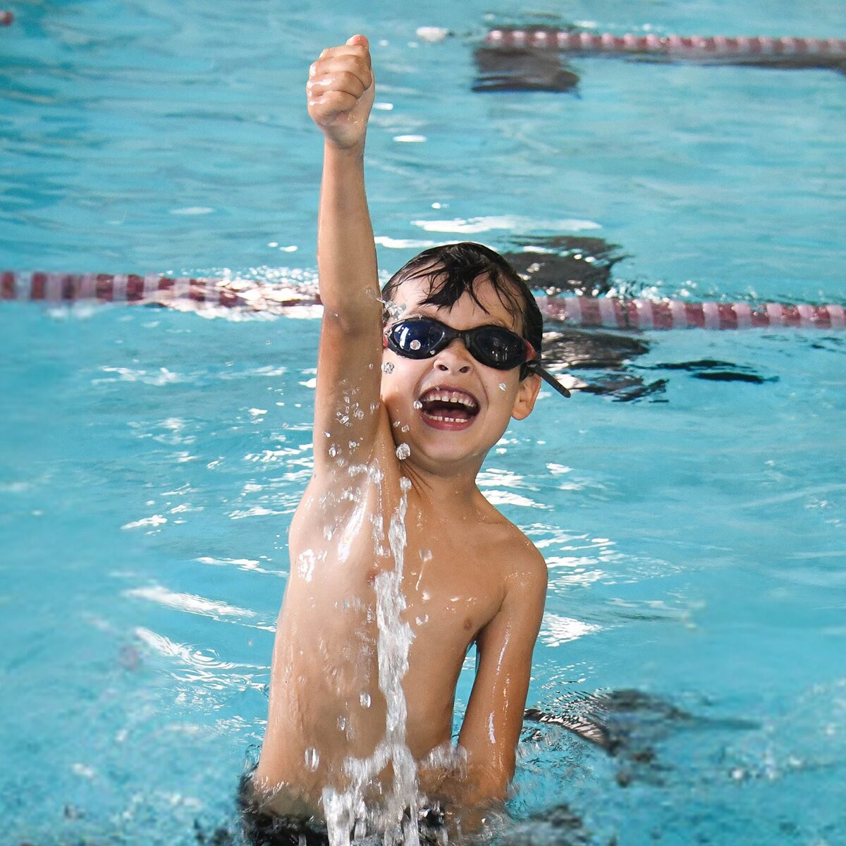 child learning to swim