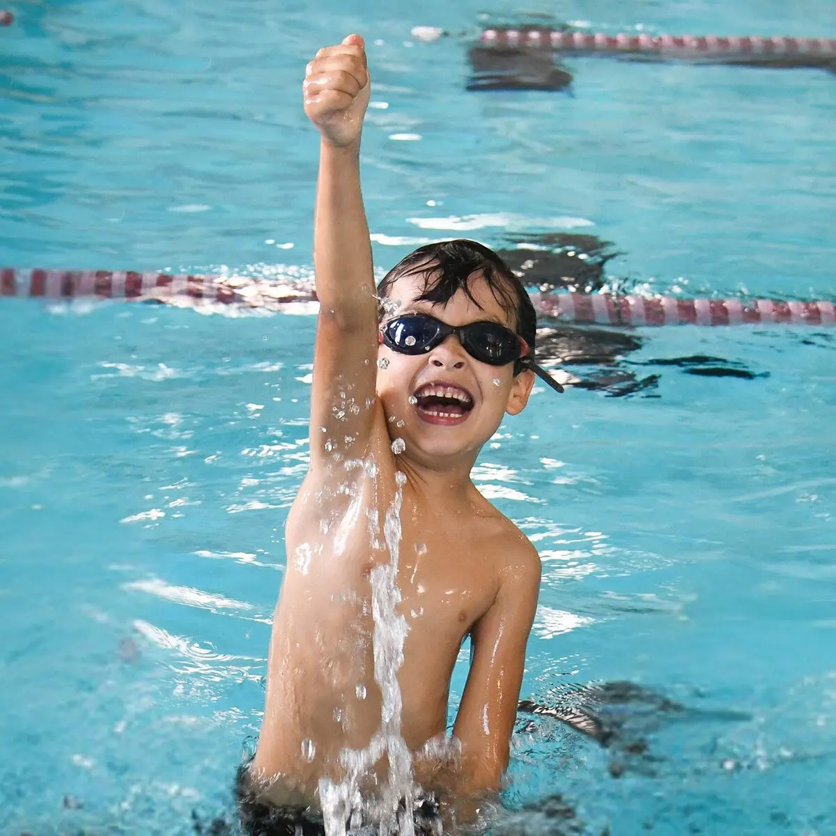 child learning to swim