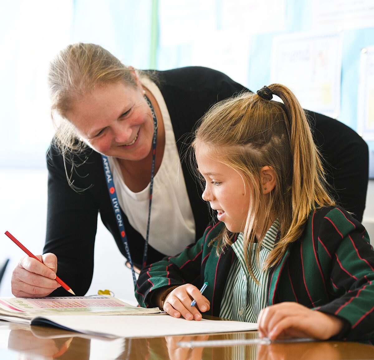 prep teacher with pupil